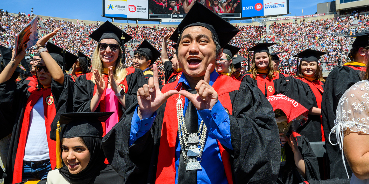 Graduating students celebrating at a commencement ceremony
