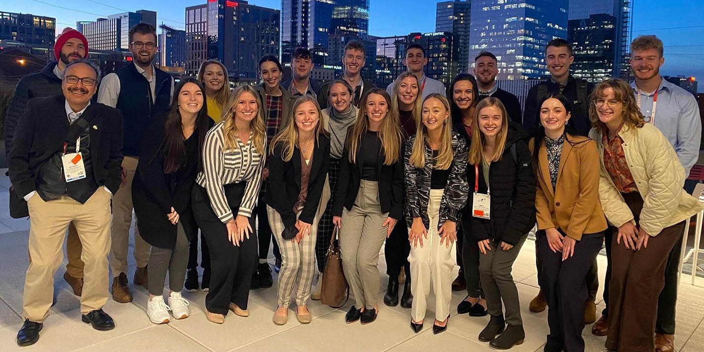 Students in the Planning and Landscape Architecture program pose for a picture